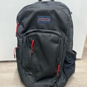 JanSport Padded Black Backpack with Red Accents